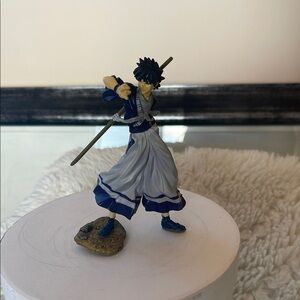 Dynamic Warrior Figurine in Blue and White